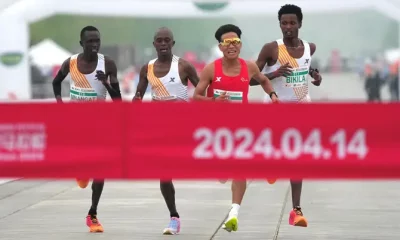 The top three in Sunday’s Beijing half marathon have been stripped of their medals, organisers said, following an investigation