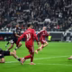Liverpool stars Mohamed Salah, Alexander Isak, and Florian Wirtz look dejected after a missed chance in the Champions League