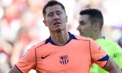 Robert Lewandowski reacts in frustration during Barcelona match before injury setback