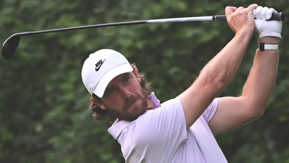 Tommy Fleetwood celebrates after shooting 64 to lead the DP World India Championship second round