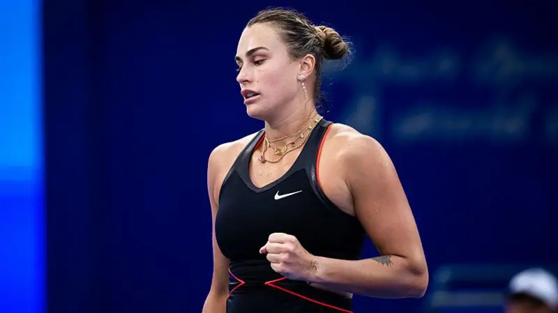 Aryna Sabalenka celebrates after defeating Rebecca Sramkova in a three-set comeback win at the Wuhan Open 2025.