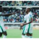 Victor Osimhen celebrates with Gift Adams after scoring on his Super Eagles debut