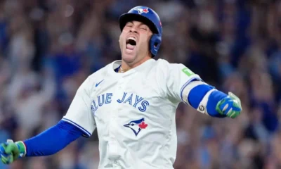 Toronto Blue Jays players celebrate Game 7 victory over Seattle Mariners