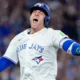 Toronto Blue Jays players celebrate Game 7 victory over Seattle Mariners