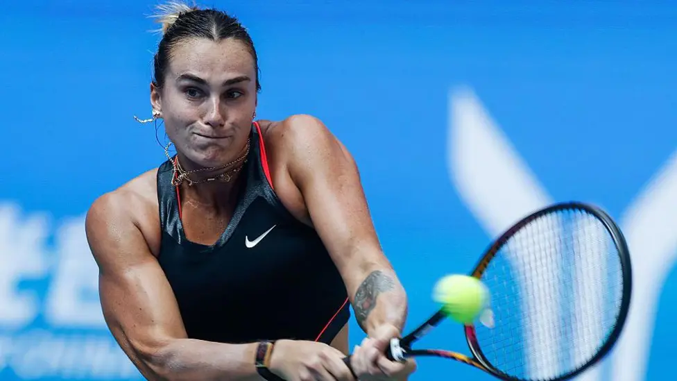 Aryna Sabalenka celebrates victory at the Wuhan Open after extending her winning streak to 20 matches.