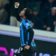 Ademola Lookman celebrates after scoring for Atalanta in their Serie A draw against AC Milan.