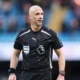 Premier League referee Anthony Taylor officiating a match in England.
