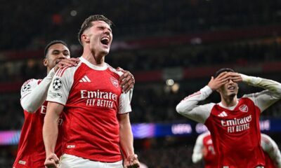 Arsenal players celebrating a goal against Atletico Madrid at the Emirates Stadium