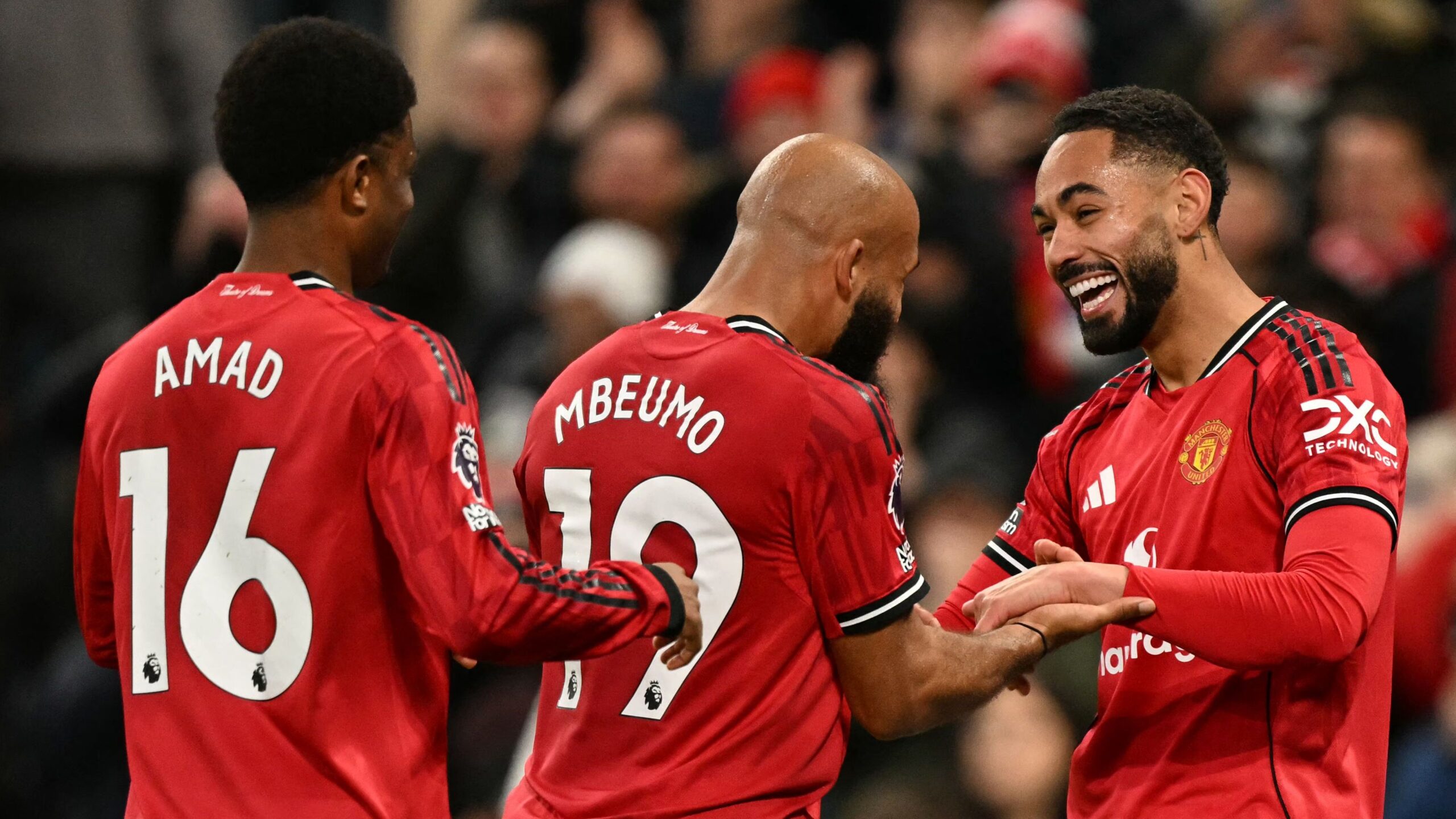 Bryan Mbeumo and Amad Diallo celebrating a goal for Manchester United under Ruben Amorim