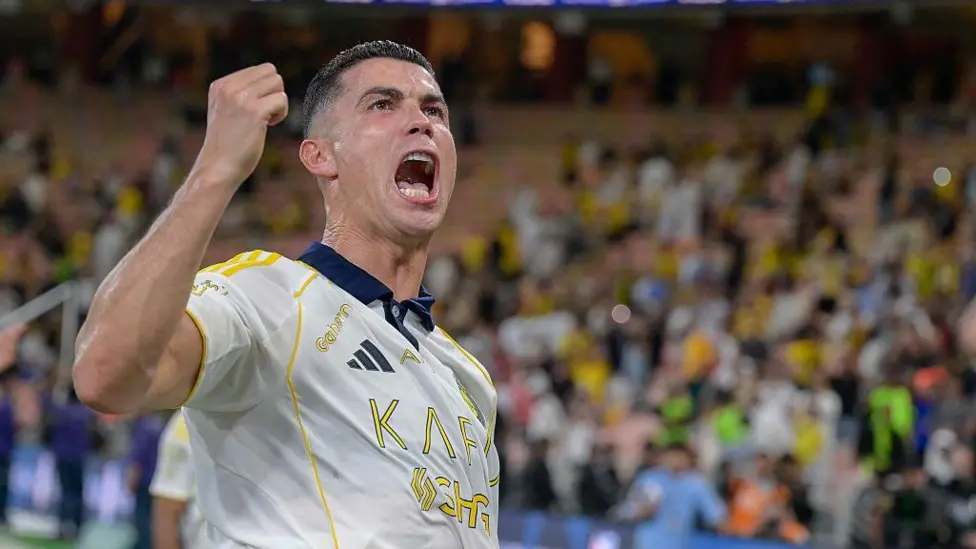 Cristiano Ronaldo celebrating in an Al-Nassr jersey after becoming football’s first billionaire player with a $1.4bn net worth.