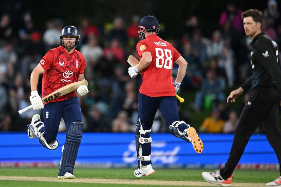 England cricket team celebrates T20 series win against New Zealand in Auckland despite rain