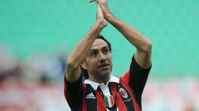 Alessandro Nesta celebrates a Champions League victory with AC Milan in 2003.