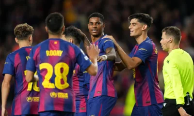 Marcus Rashford celebrating a goal for Barcelona against Olympiacos in the Champions League