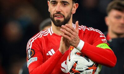 Bruno Fernandes applauding Manchester United fans at Old Trafford