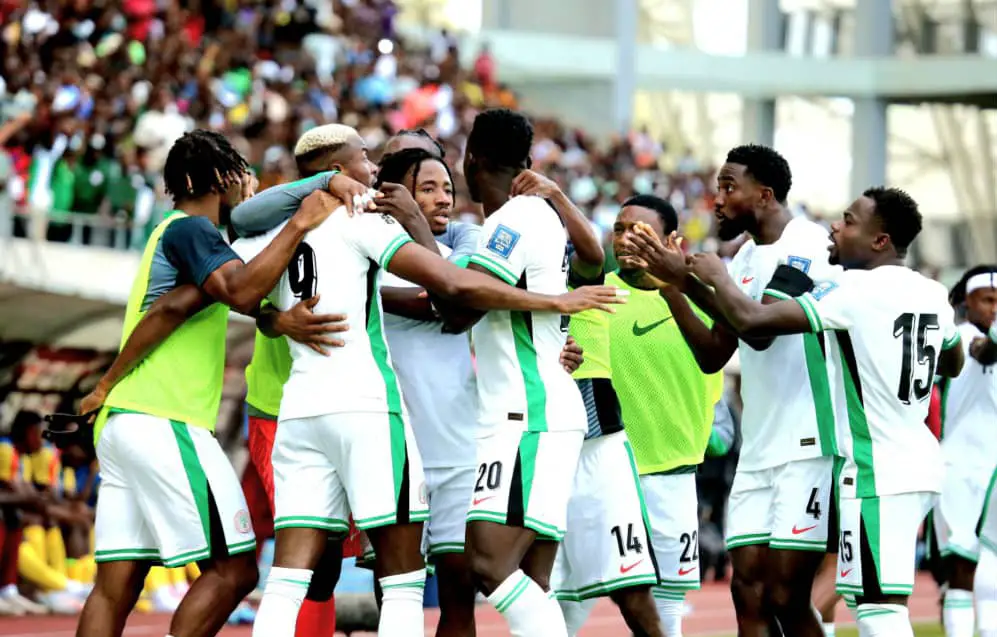 William Troost-Ekong celebrating with Super Eagles teammates after victory against Benin Republic