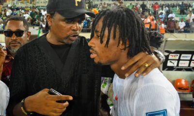 Kanu Nwankwo giving advice to Benjamin Fredrick during Nigeria training session