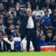 Jose Mourinho on the sidelines during a Benfica match looking focused