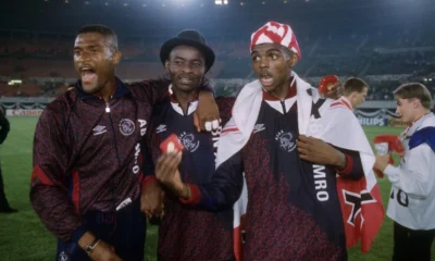 “Nwankwo Kanu wearing Ajax jersey, smiling as he announces return to football with Ajax Legends”
