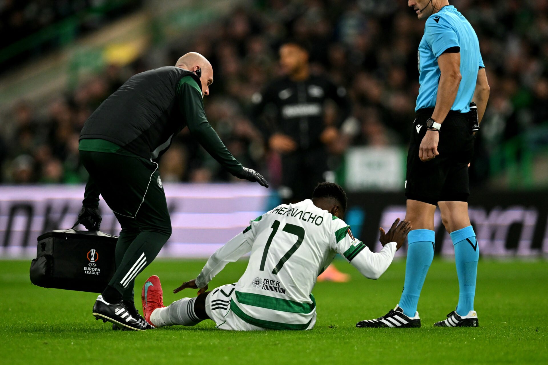 Kelechi Iheanacho holding his hamstring while walking off the pitch during Celtic’s Europa League match against Sturm Graz.