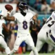 Lamar Jackson celebrating after throwing a touchdown pass in the Baltimore Ravens’ win over the Miami Dolphins.