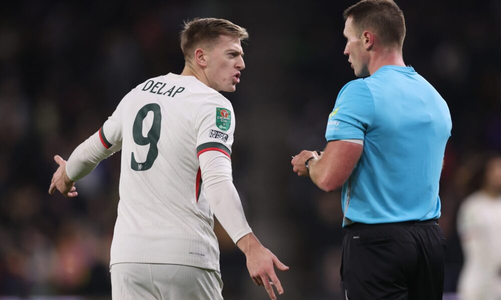 Liam Delap walks off the pitch after being sent off in the Carabao Cup match against Wolves