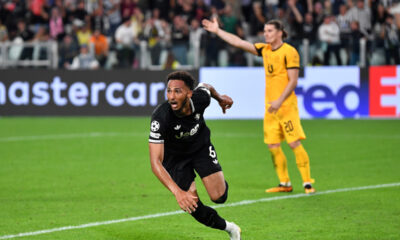 Lloyd Kelly celebrates after scoring for Juventus in the Champions League.