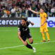Lloyd Kelly celebrates after scoring for Juventus in the Champions League.