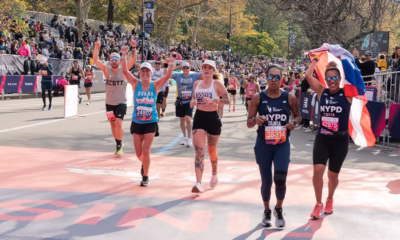 Marathon runners competing under hot conditions during a global race affected by rising temperatures