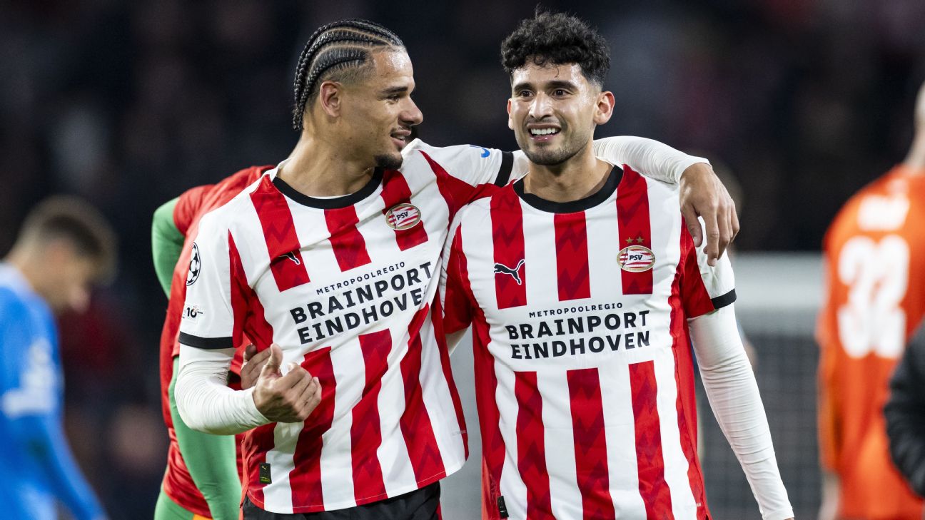 PSV Eindhoven players celebrate after scoring in their 6-2 Champions League win over Napoli.