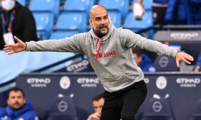 Pep Guardiola gestures on the touchline during Manchester City’s Premier League match.