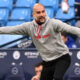 Pep Guardiola gestures on the touchline during Manchester City’s Premier League match.