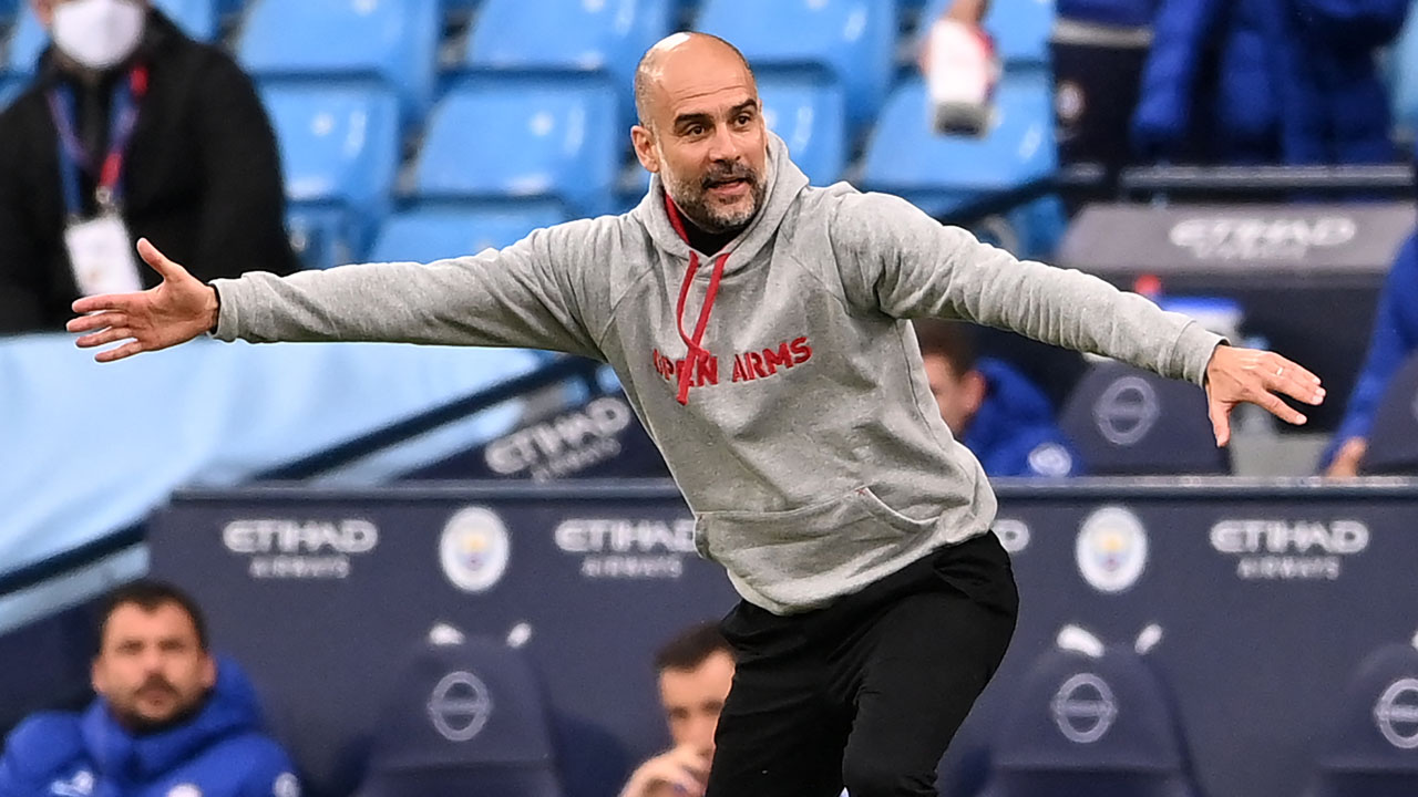 Pep Guardiola gestures on the touchline during Manchester City’s Premier League match.