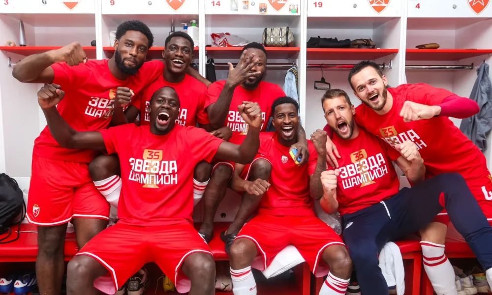 Peter Olayinka celebrating a goal in a Red Star Belgrade jersey