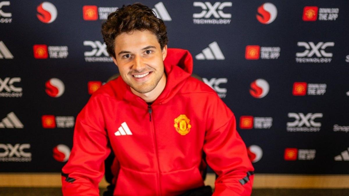 Senne Lammens Manchester United goalkeeper smiling during post-match interview