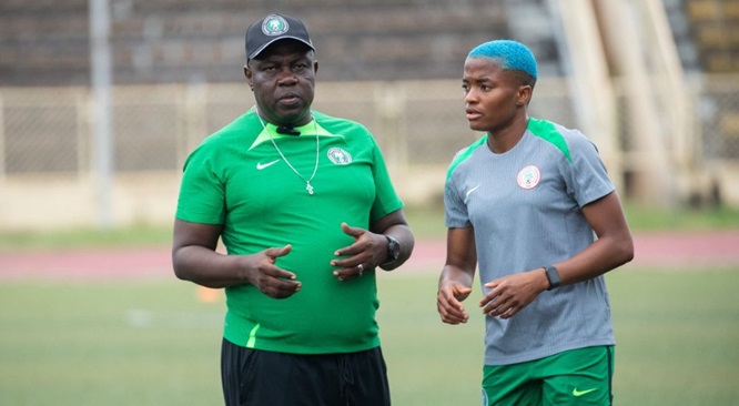 Super Falcons head coach Justine Madugu addressing players ahead of WAFCON 2026 qualifier against Benin Republic