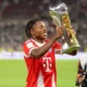 Wisdom Mike celebrates after making his Champions League debut for Bayern Munich