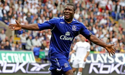 Yakubu Aiyegbeni celebrating after scoring a Premier League goal during his Everton career.