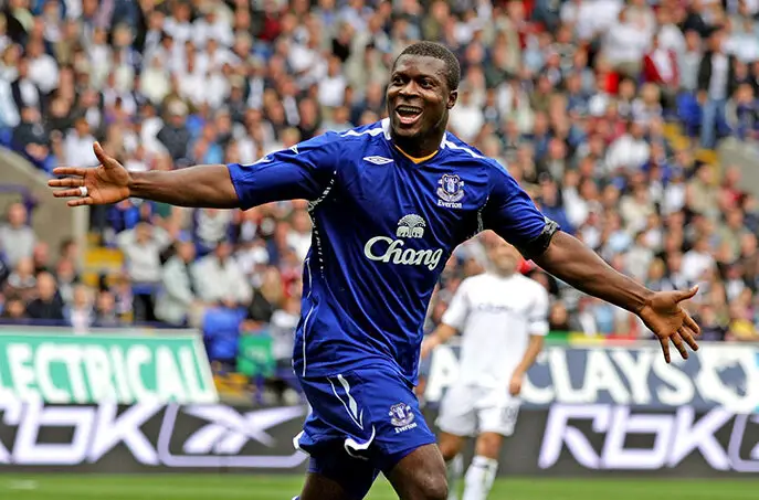 Yakubu Aiyegbeni celebrating after scoring a Premier League goal during his Everton career.