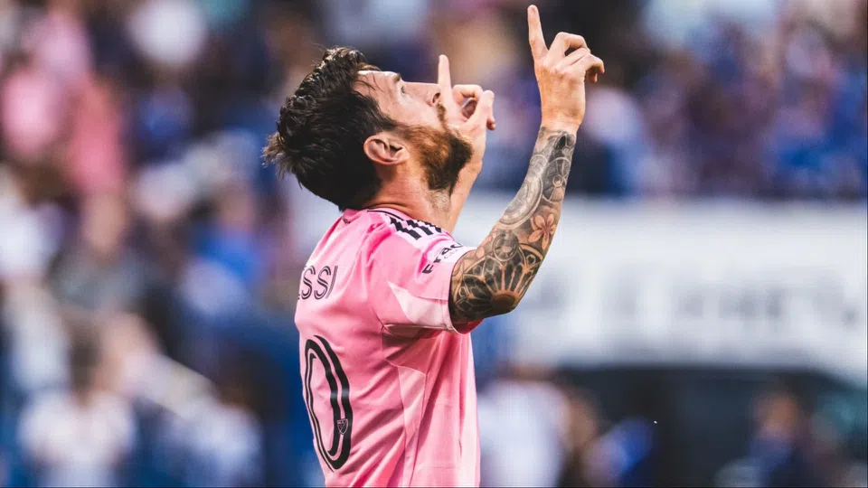 Lionel Messi looks to the sky in gratitude after scoring for Argentina.