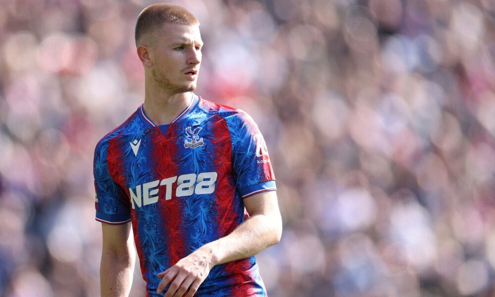 Adam Wharton in action for Crystal Palace during a Premier League match.