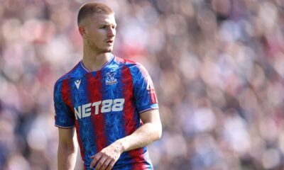 Adam Wharton in action for Crystal Palace during a Premier League match.