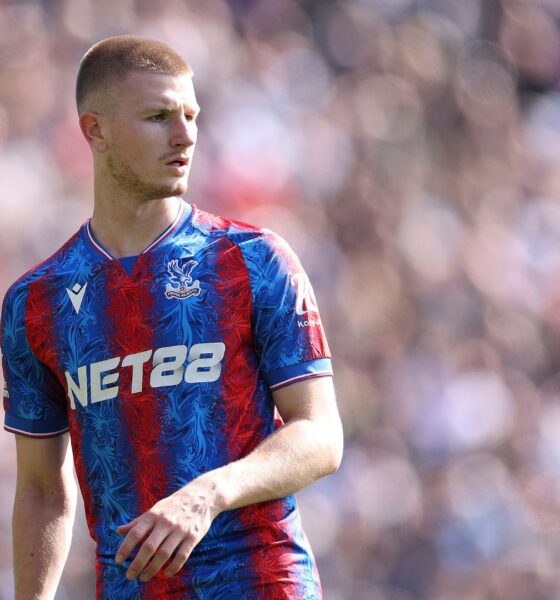 Adam Wharton in action for Crystal Palace during a Premier League match.