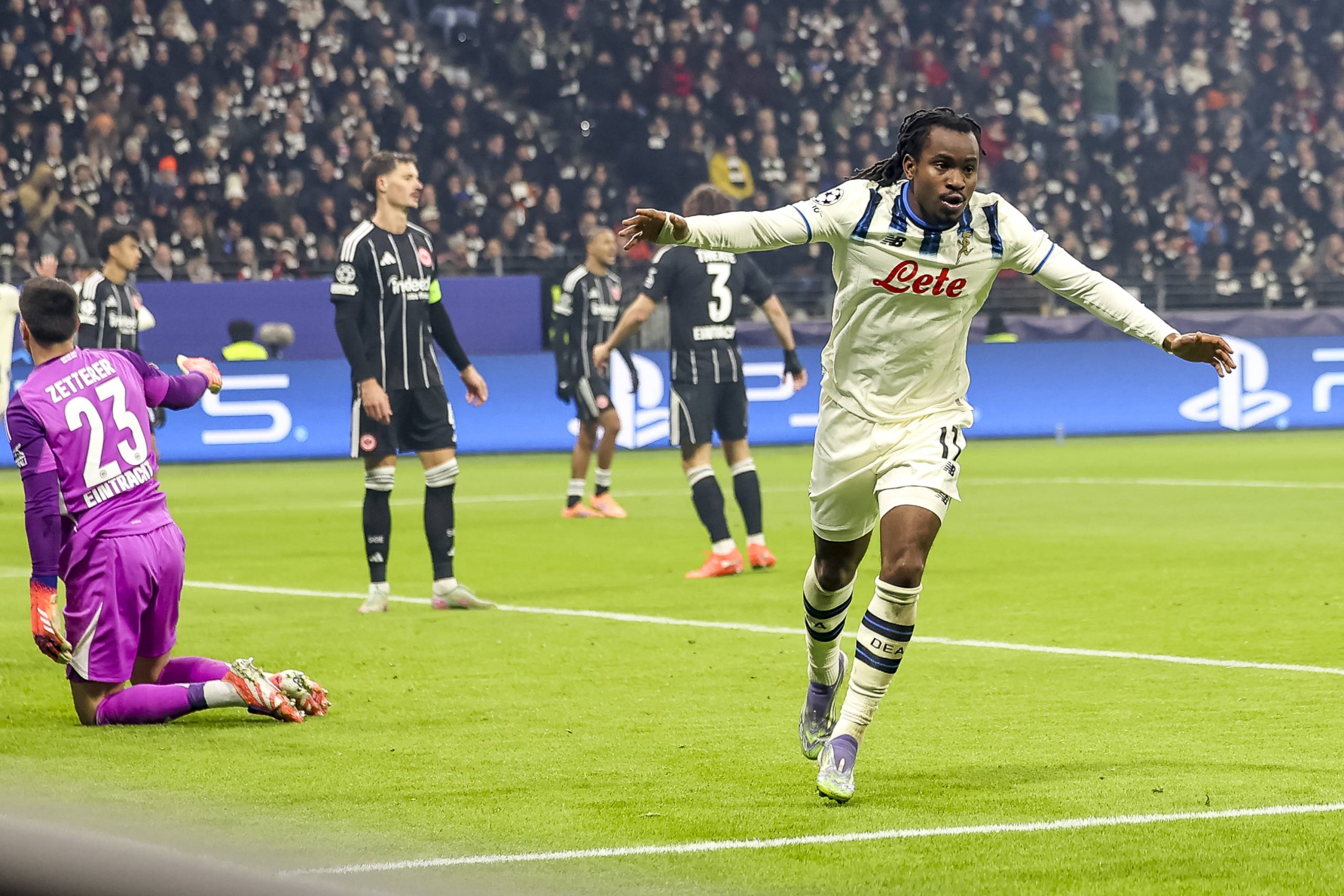 Ademola Lookman celebrates scoring for Atalanta in UEFA Champions League match against Frankfurt