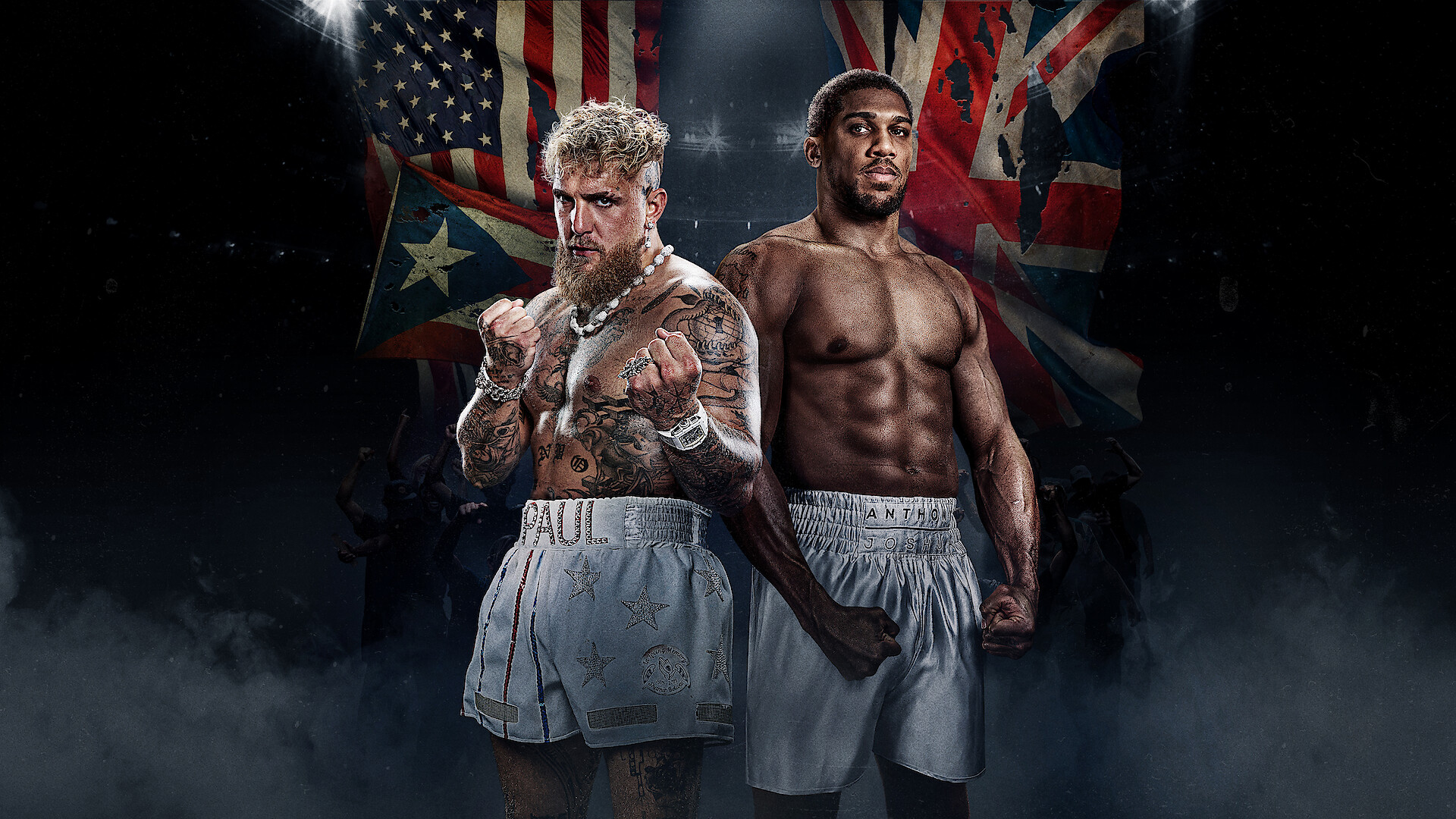 Anthony Joshua and Jake Paul face-off poster ahead of December 19 boxing match.