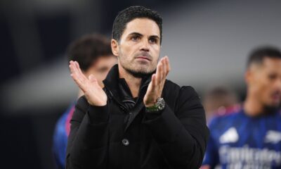 Arsenal manager Mikel Arteta on the sidelines, expressing frustration over fixture congestion during a Premier League match.