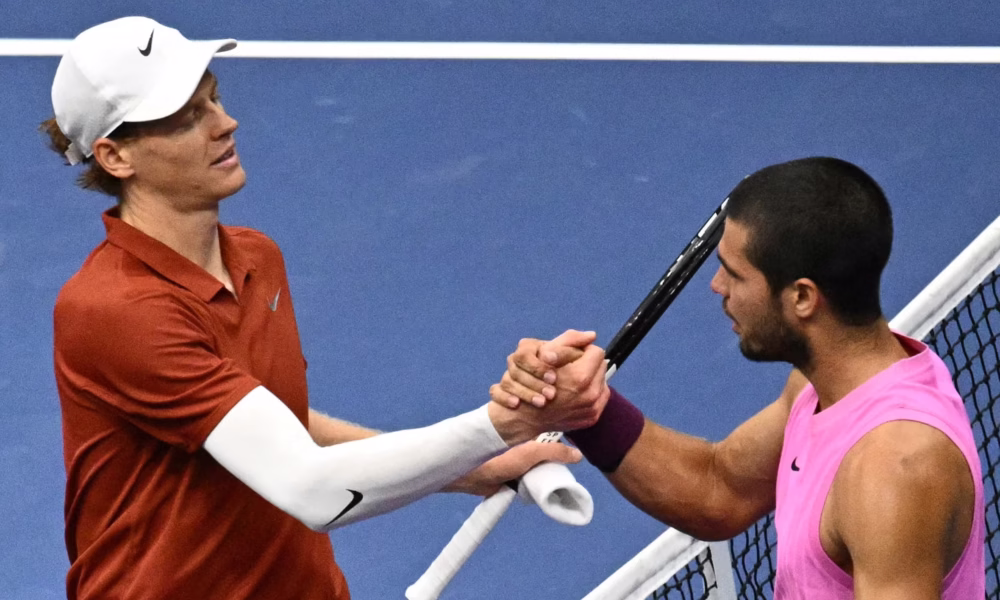 Carlos Alcaraz and Jannik Sinner shaking hands after a tennis match