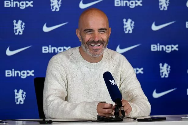 Chelsea manager Enzo Maresca on the touchline during Premier League match, eyeing midfield reinforcements