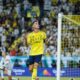 Cristiano Ronaldo celebrating a goal for Al-Nassr as Carlo Ancelotti praises his pursuit of 1,000 career goals