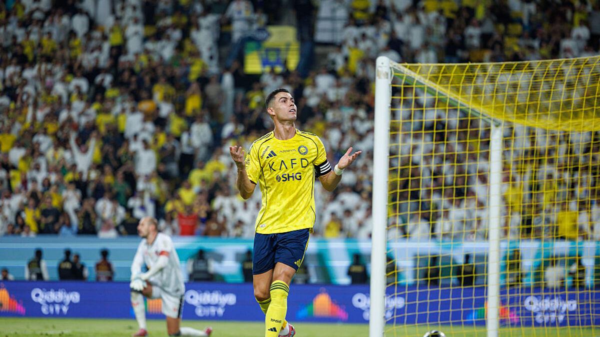Cristiano Ronaldo celebrating a goal for Al-Nassr as Carlo Ancelotti praises his pursuit of 1,000 career goals