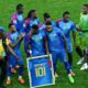 DR Congo head coach Sébastien Desabre celebrating with players after World Cup playoff win